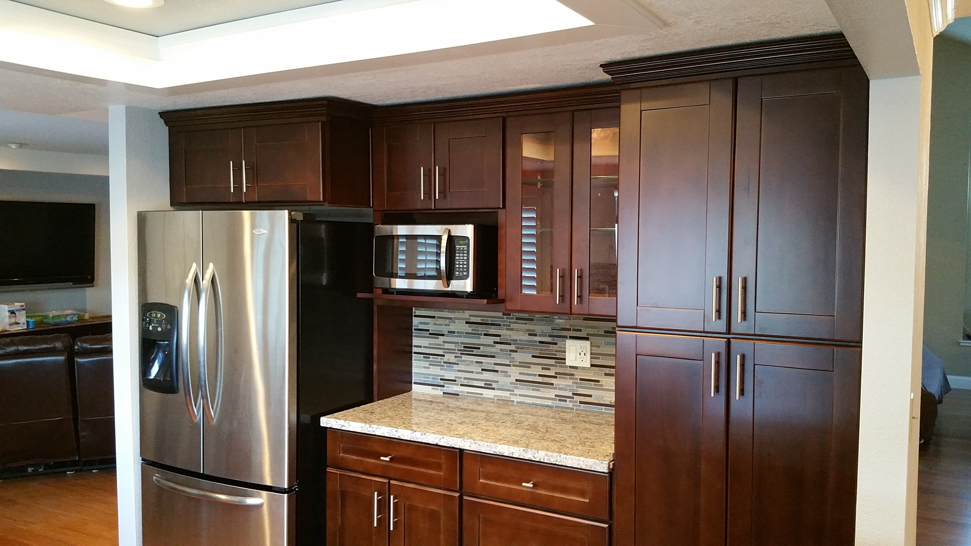 Angled front view with bag zipped and handles upright.